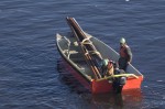 Outboard motorboat, construction crew