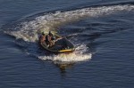 Small boat, construction crew