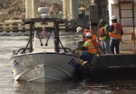 Construction crew, sheriff's boat - male and female workers