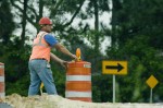 Workers moving barricades 5